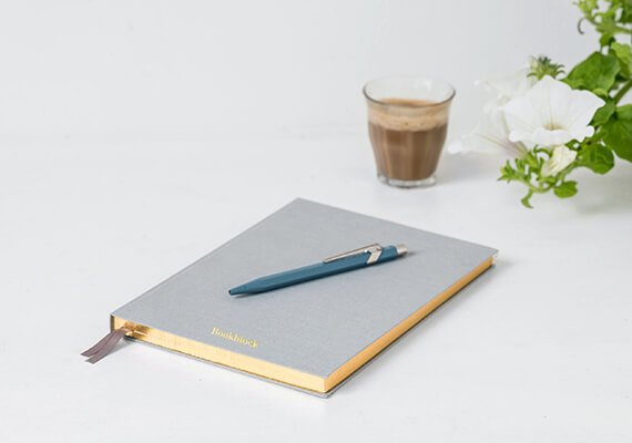 Notebook and pen